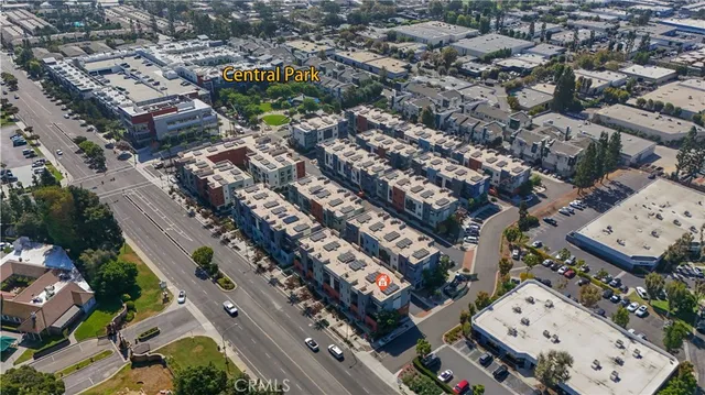 an aerial view of a city with lots of residential buildings