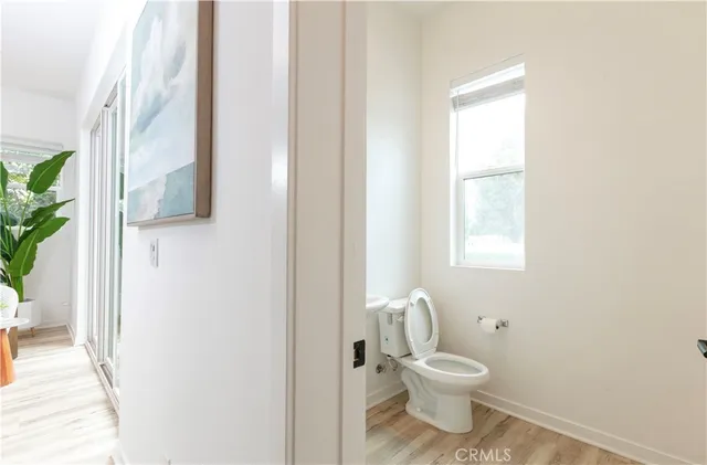 a bathroom with a toilet and a sink