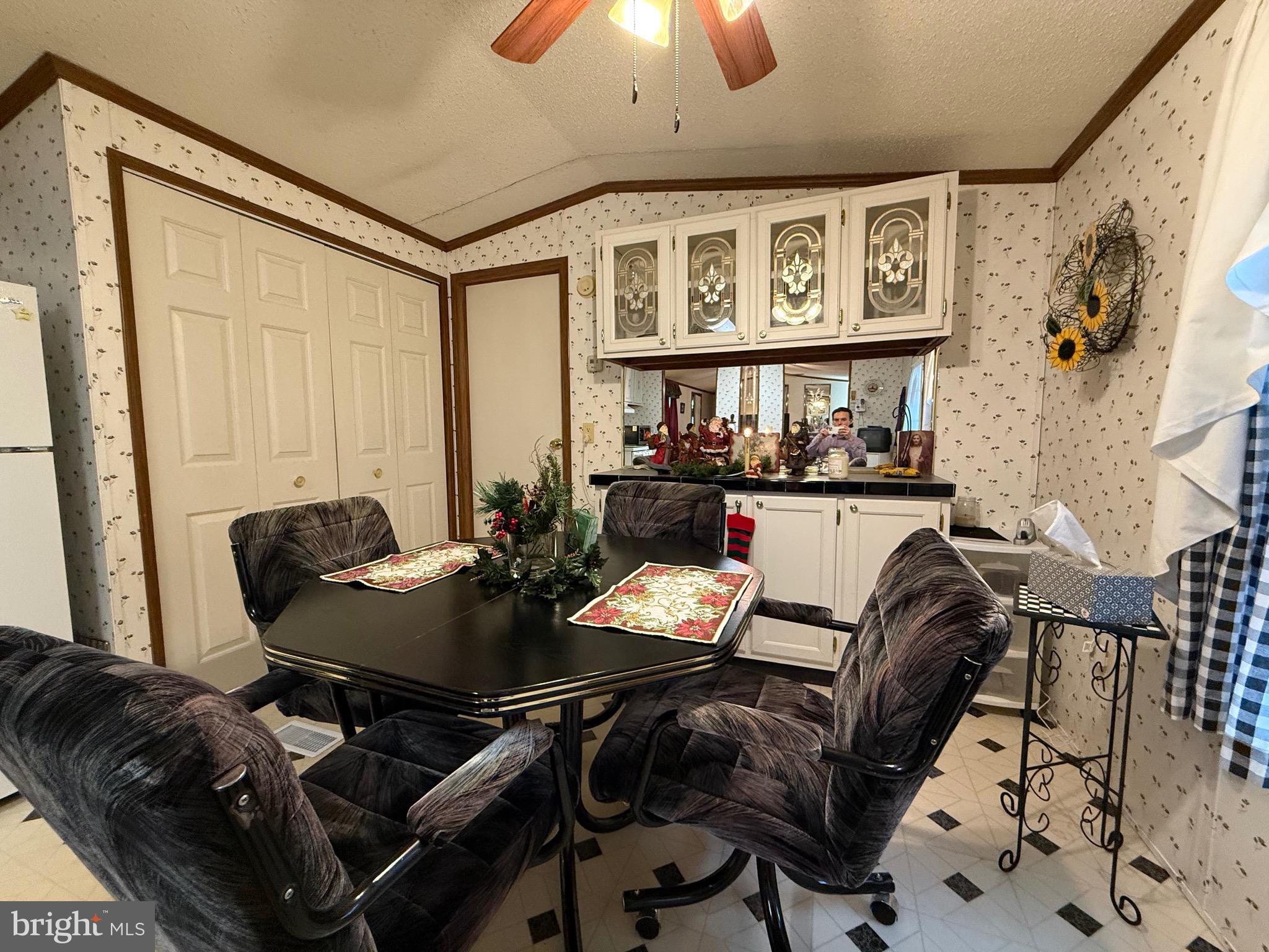 114 Pheasant Ridge Circle Lancaster, PA 17603 - Photo 12 of 24 a view of a dining room with furniture and chandelier