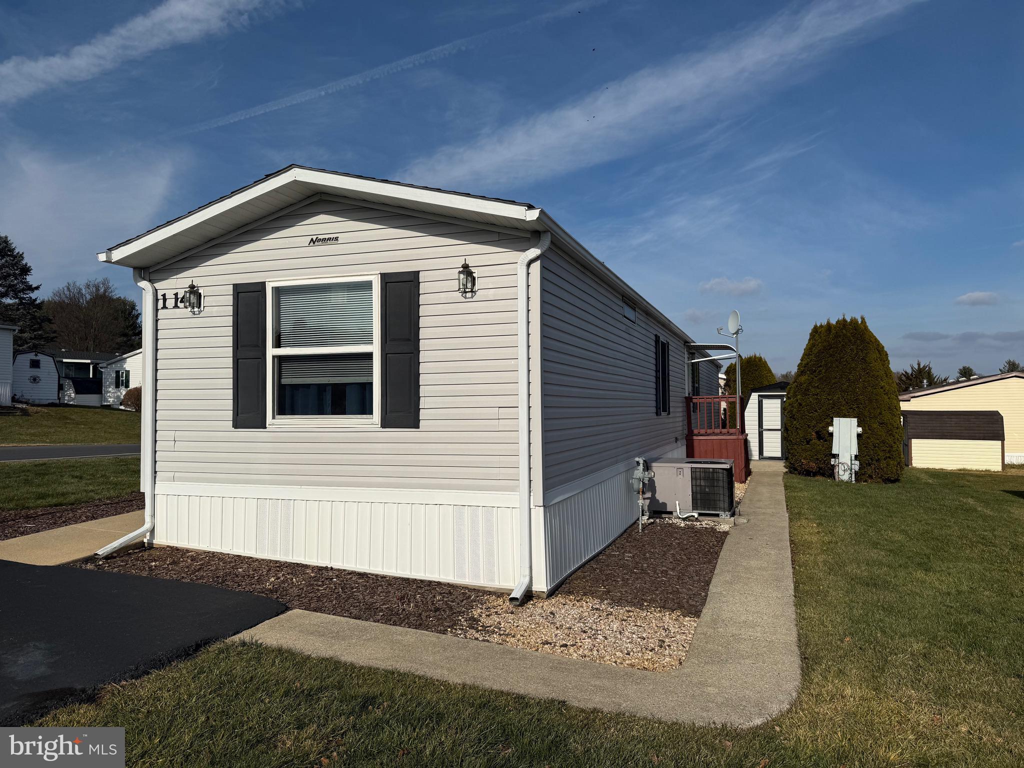 114 Pheasant Ridge Circle Lancaster, PA 17603 - Photo 2 of 30 a front view of a house with garden