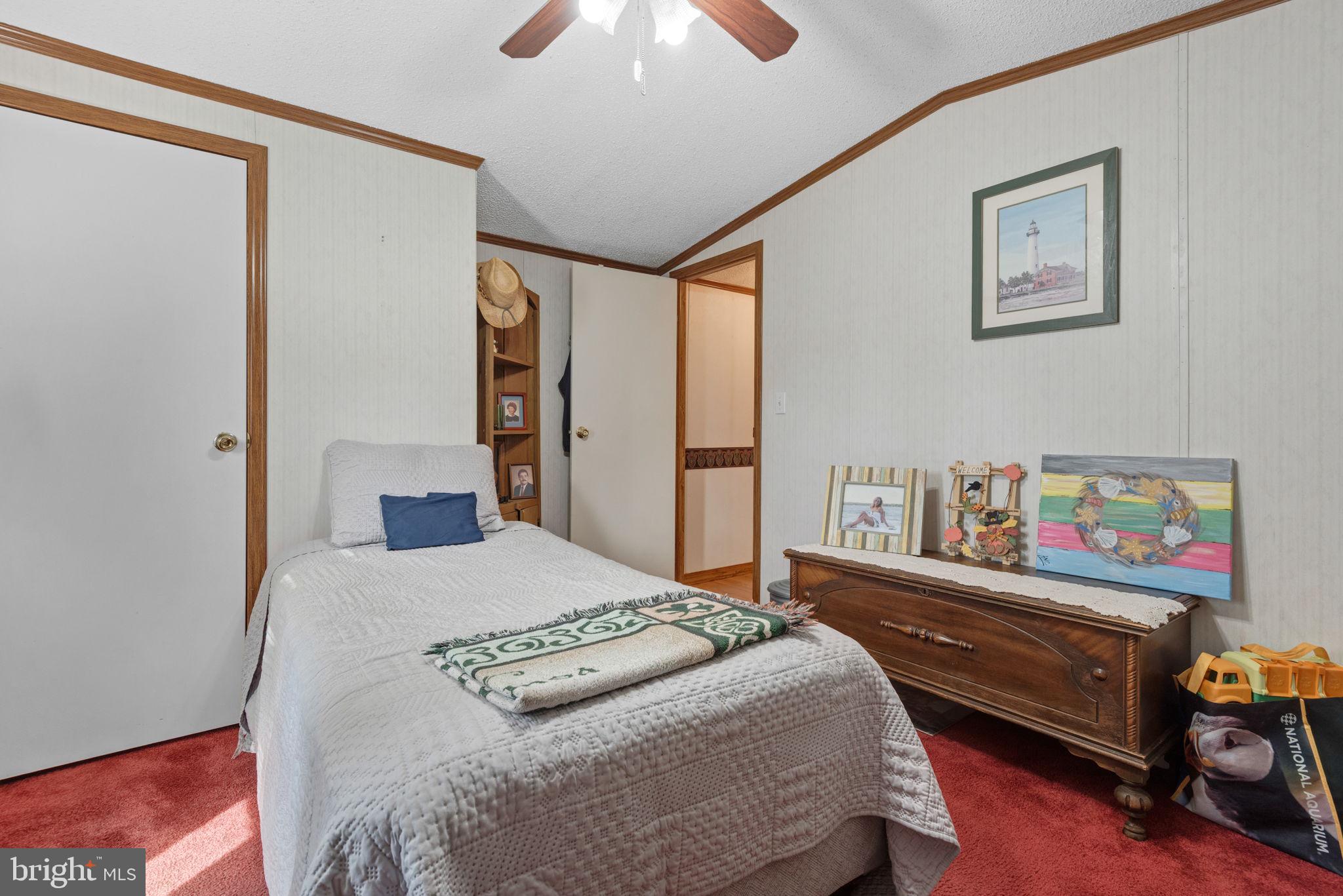 114 Pheasant Ridge Circle Lancaster, PA 17603 - Photo 23 of 30 a bedroom with a bed dresser and a baby crib