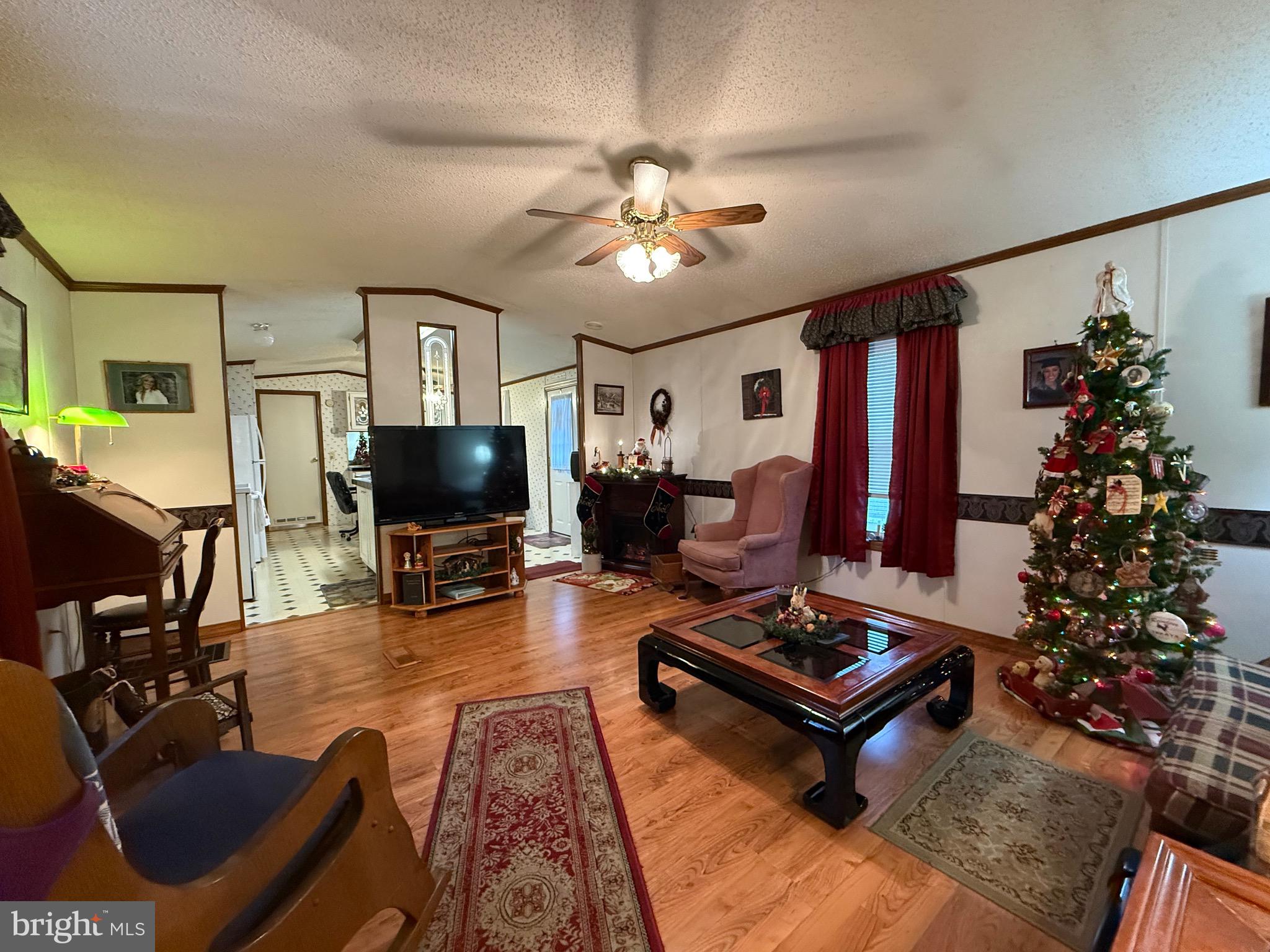114 Pheasant Ridge Circle Lancaster, PA 17603 - Photo 7 of 24 a living room with furniture and a flat screen tv