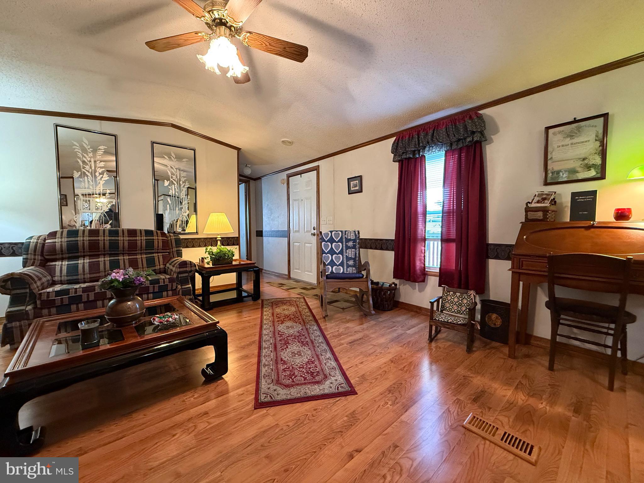 114 Pheasant Ridge Circle Lancaster, PA 17603 - Photo 7 of 30 a living room with furniture and wooden floor