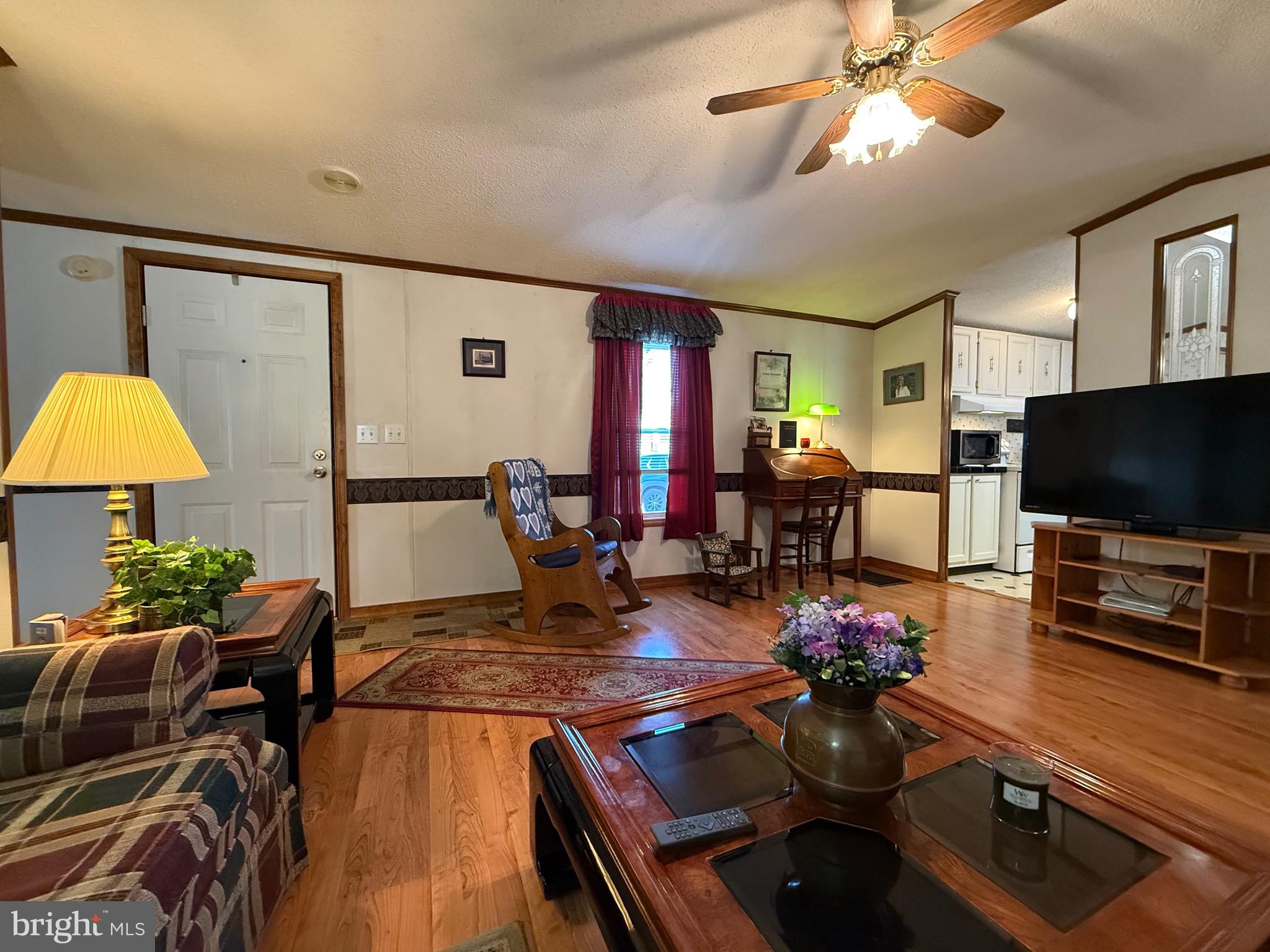 114 Pheasant Ridge Circle Lancaster, PA 17603 - Photo 8 of 30 a living room with furniture and a flat screen tv