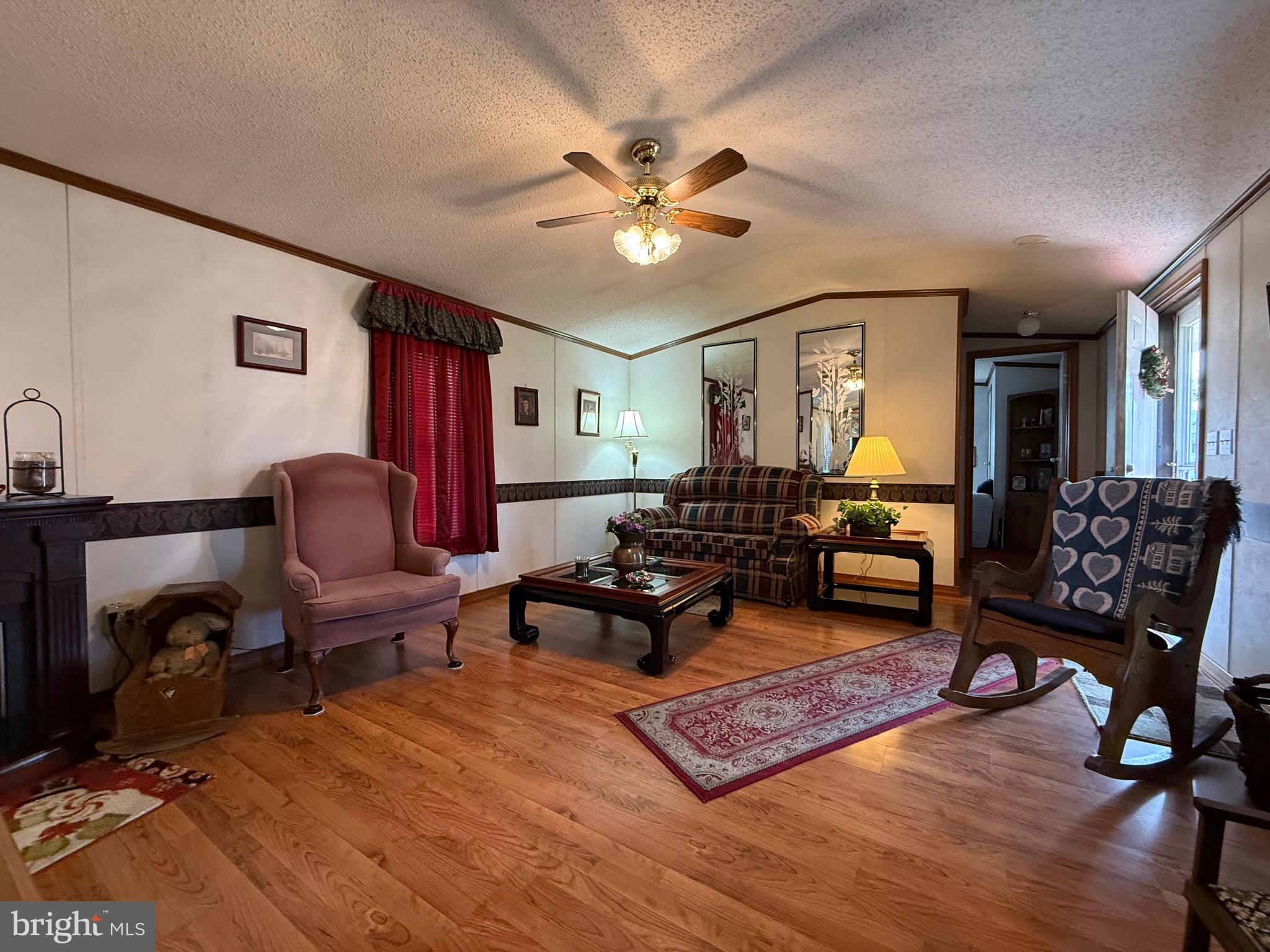 114 Pheasant Ridge Circle Lancaster, PA 17603 - Photo 9 of 30 a living room with furniture and wooden floor
