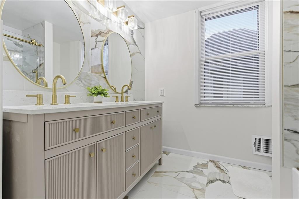 1336 4th Avenue Coraopolis, PA 15108 - Photo 21 of 50 a bathroom with a sink and a mirror
