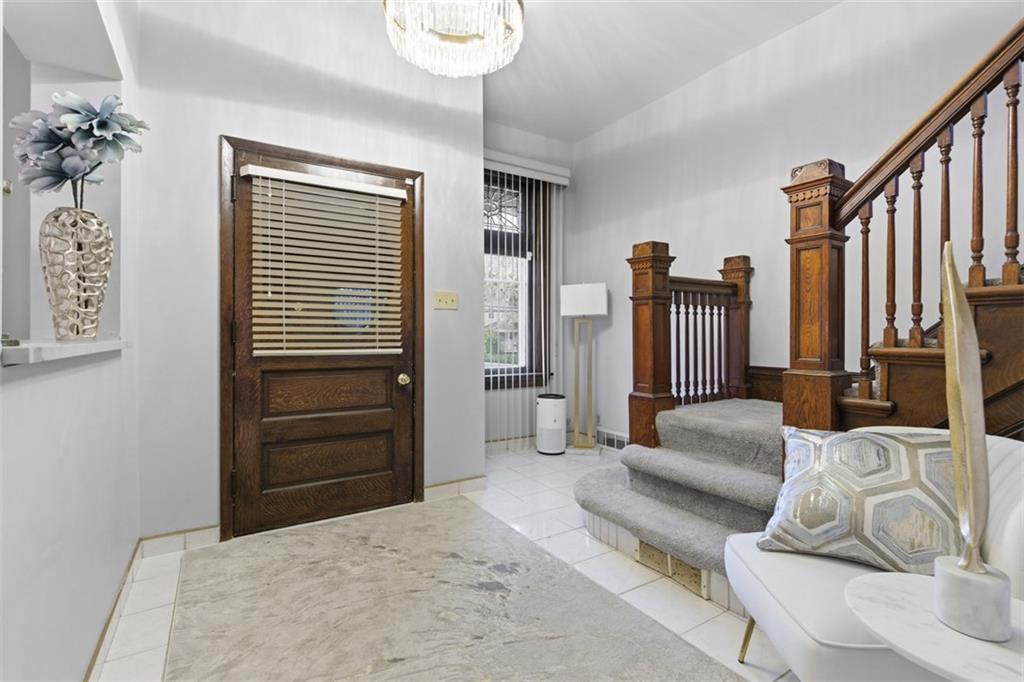 1336 4th Avenue Coraopolis, PA 15108 - Photo 3 of 50 a bedroom with furniture and a balcony