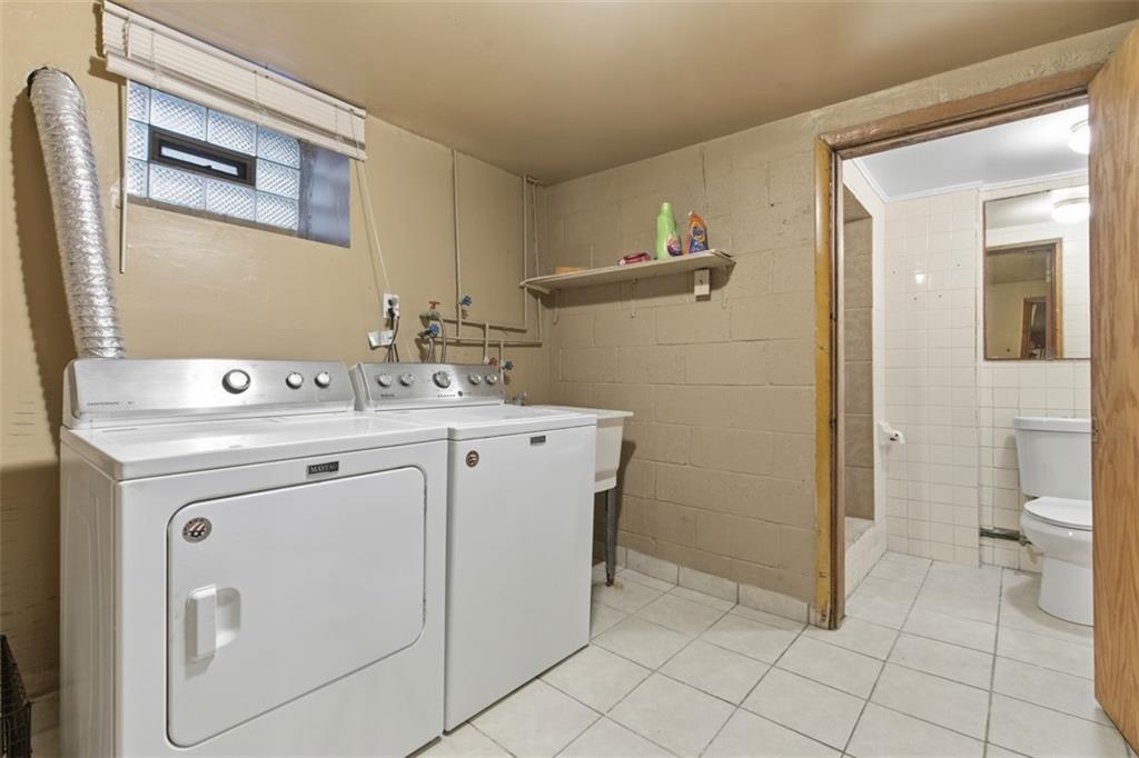 1336 4th Avenue Coraopolis, PA 15108 - Photo 43 of 50 a utility room with washer and dryer