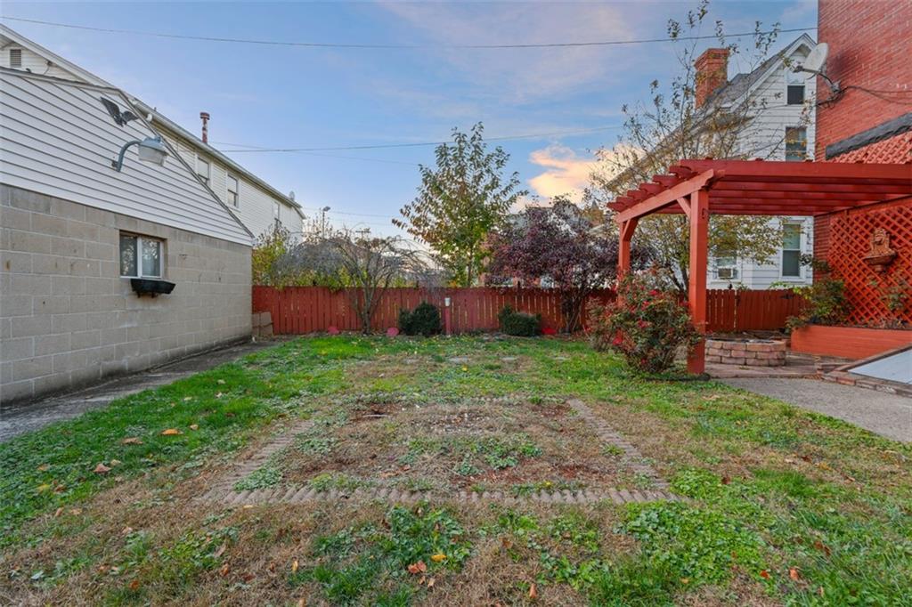 1336 4th Avenue Coraopolis, PA 15108 - Photo 47 of 50 a view of a backyard with plants and a patio