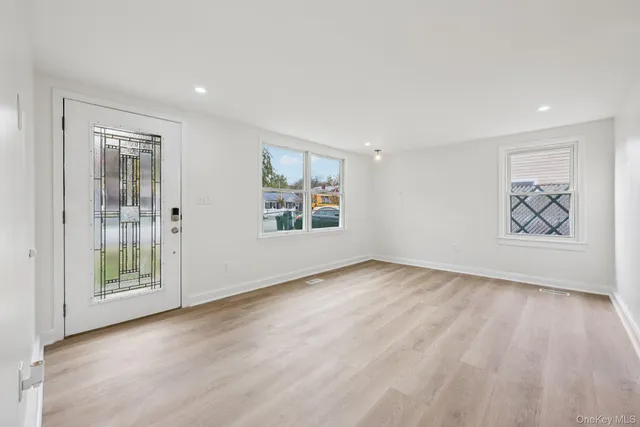 a kitchen with stainless steel appliances a refrigerator stove microwave and cabinets