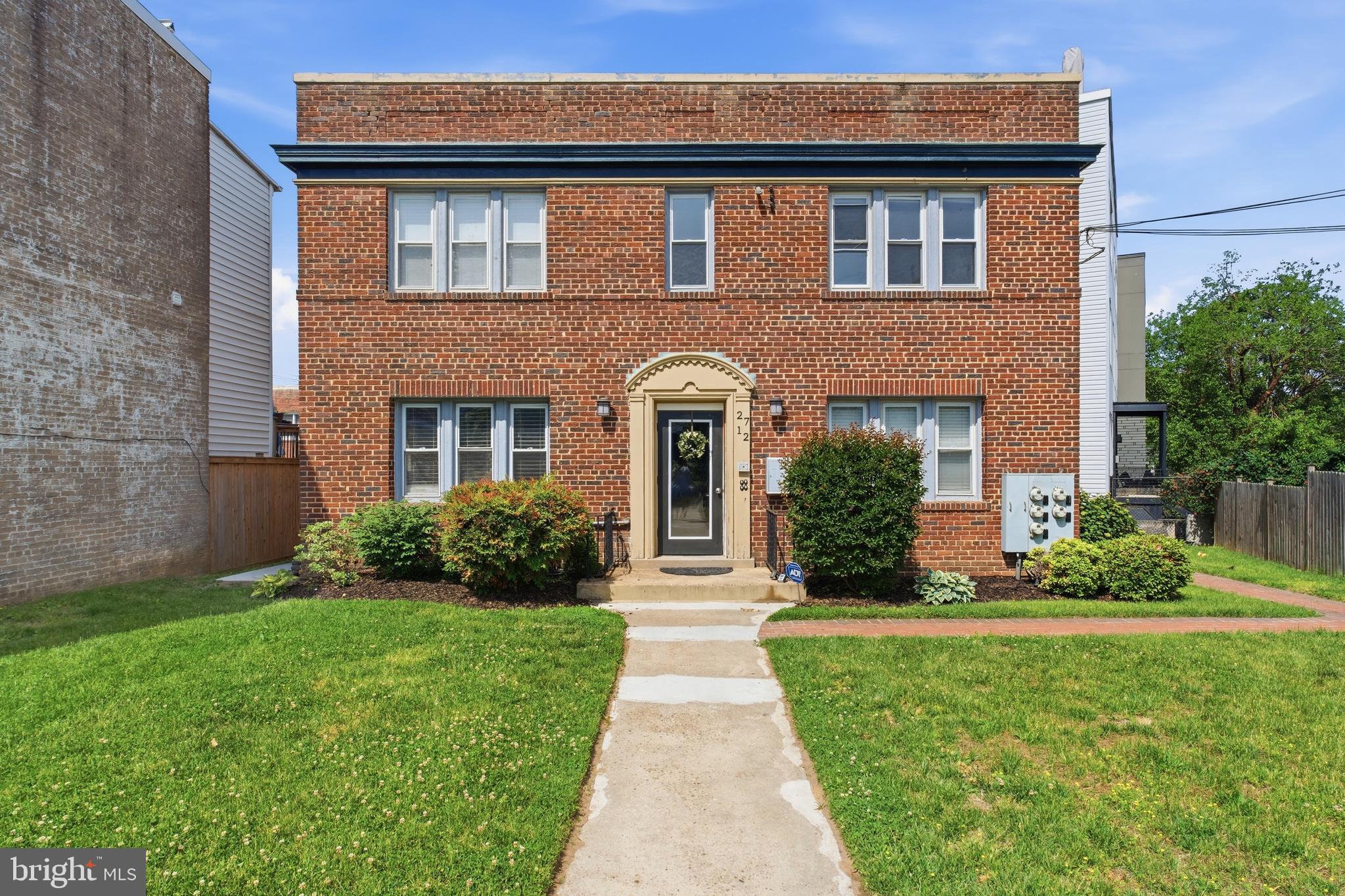 2712 6th Street Northeast Washington, DC 20017 - Photo 1 of 24 a front view of a house with garden