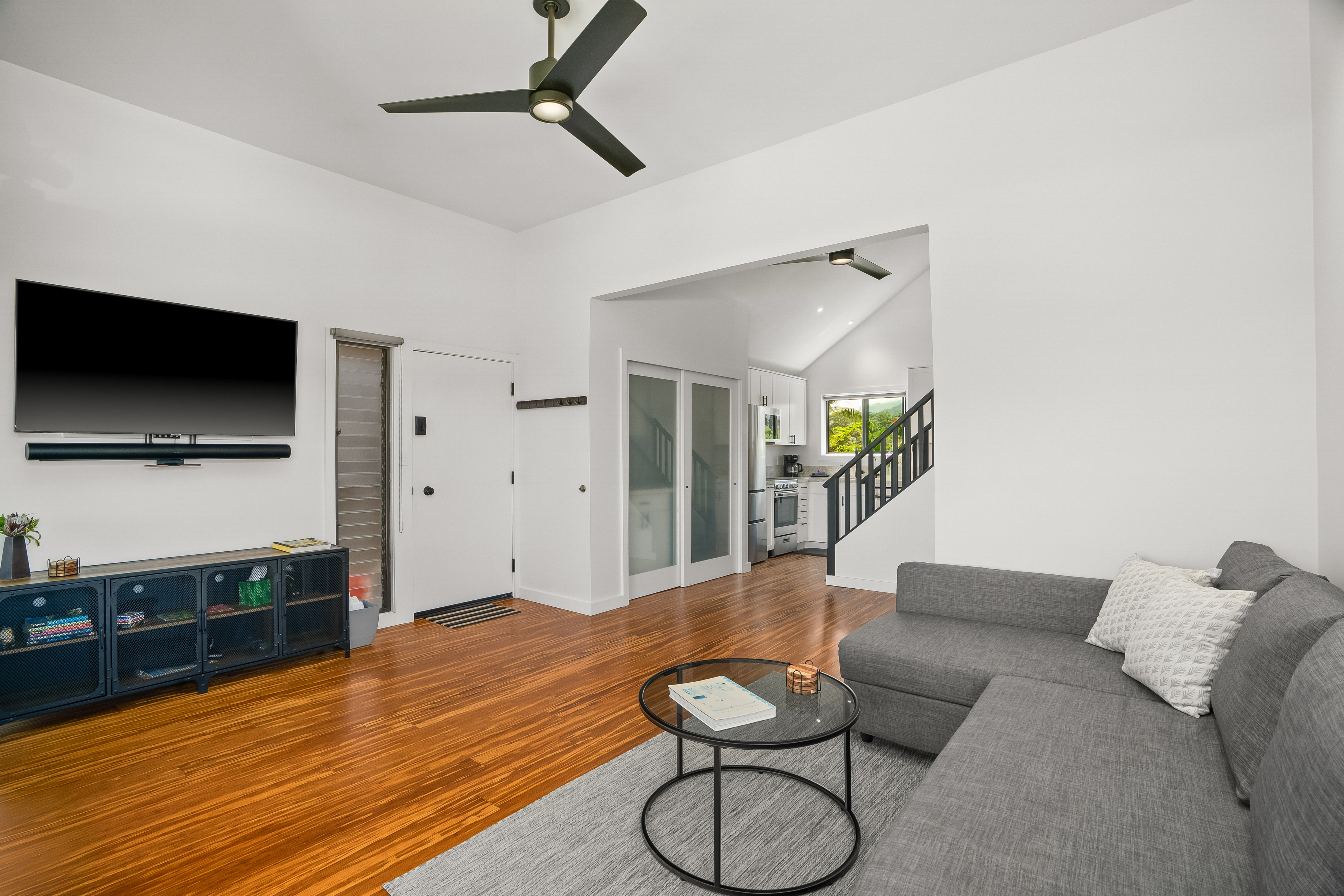 3700 Kamehameha Road, Unit F8 Princeville, HI 96722 - Photo 11 of 30 a living room with furniture and a flat screen tv
