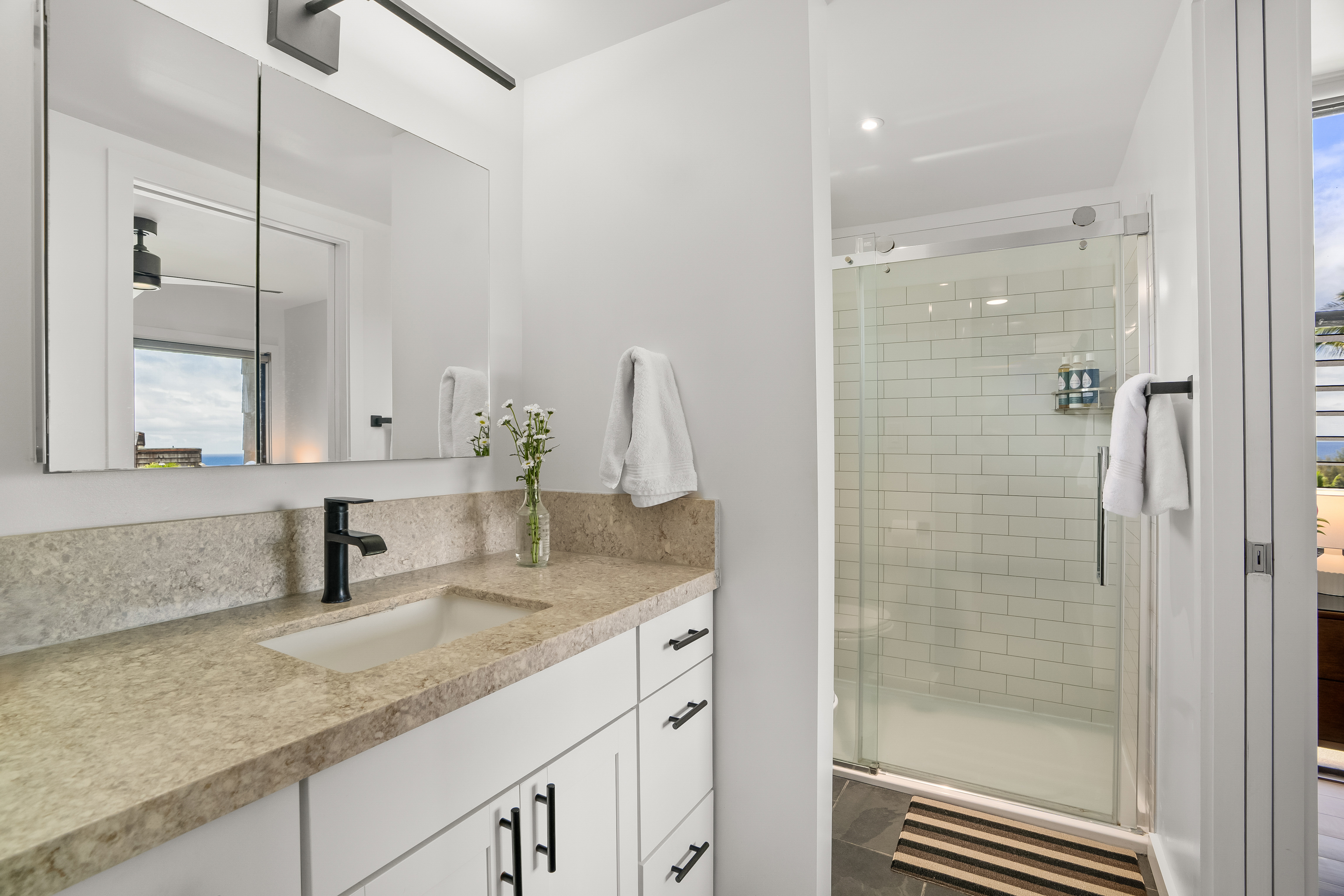 3700 Kamehameha Road, Unit F8 Princeville, HI 96722 - Photo 16 of 30 a bathroom with a sink and a mirror