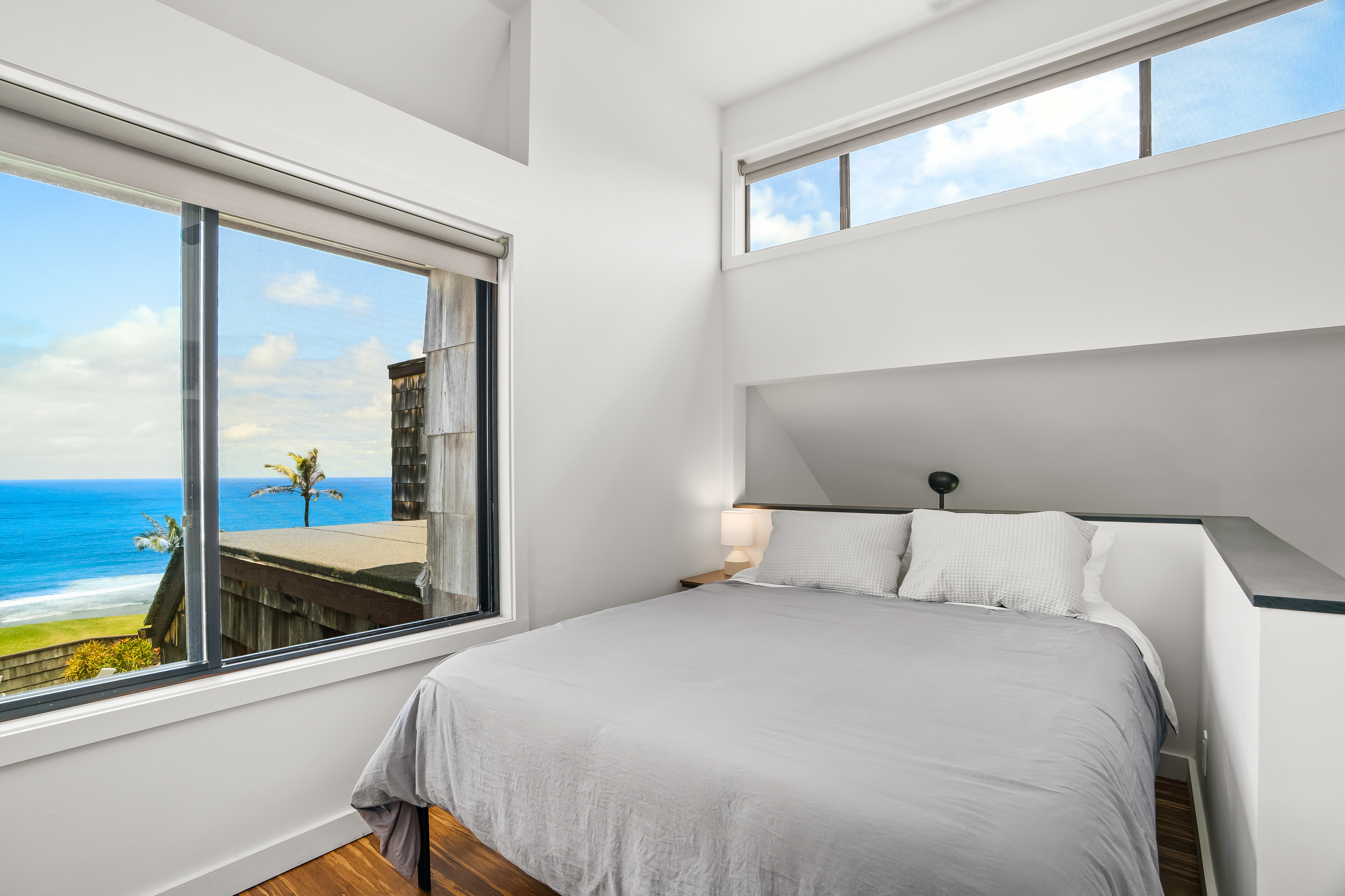 3700 Kamehameha Road, Unit F8 Princeville, HI 96722 - Photo 19 of 30 a bedroom with a large bed and a window