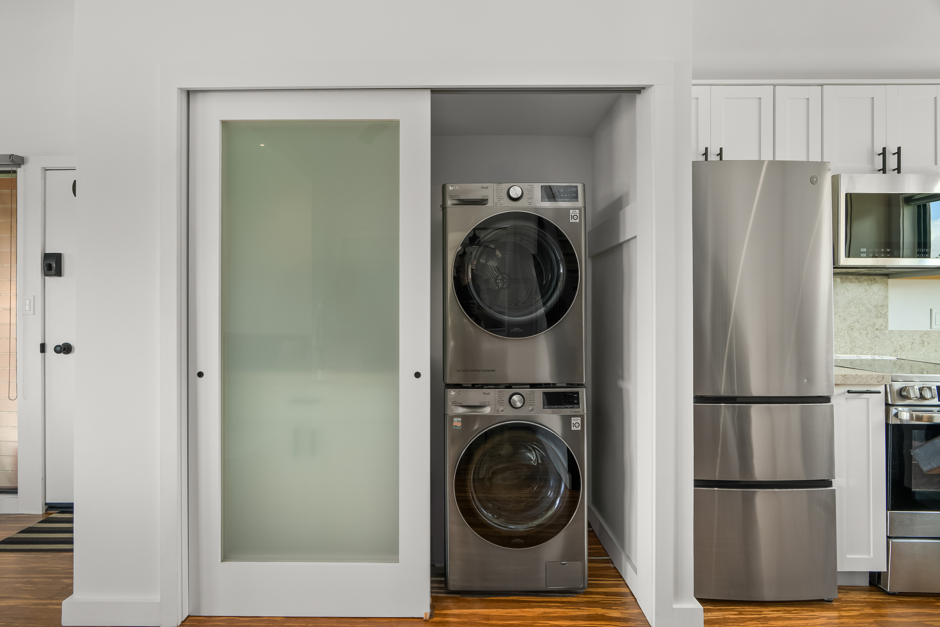 3700 Kamehameha Road, Unit F8 Princeville, HI 96722 - Photo 23 of 30 a view of a kitchen with washer and dryer