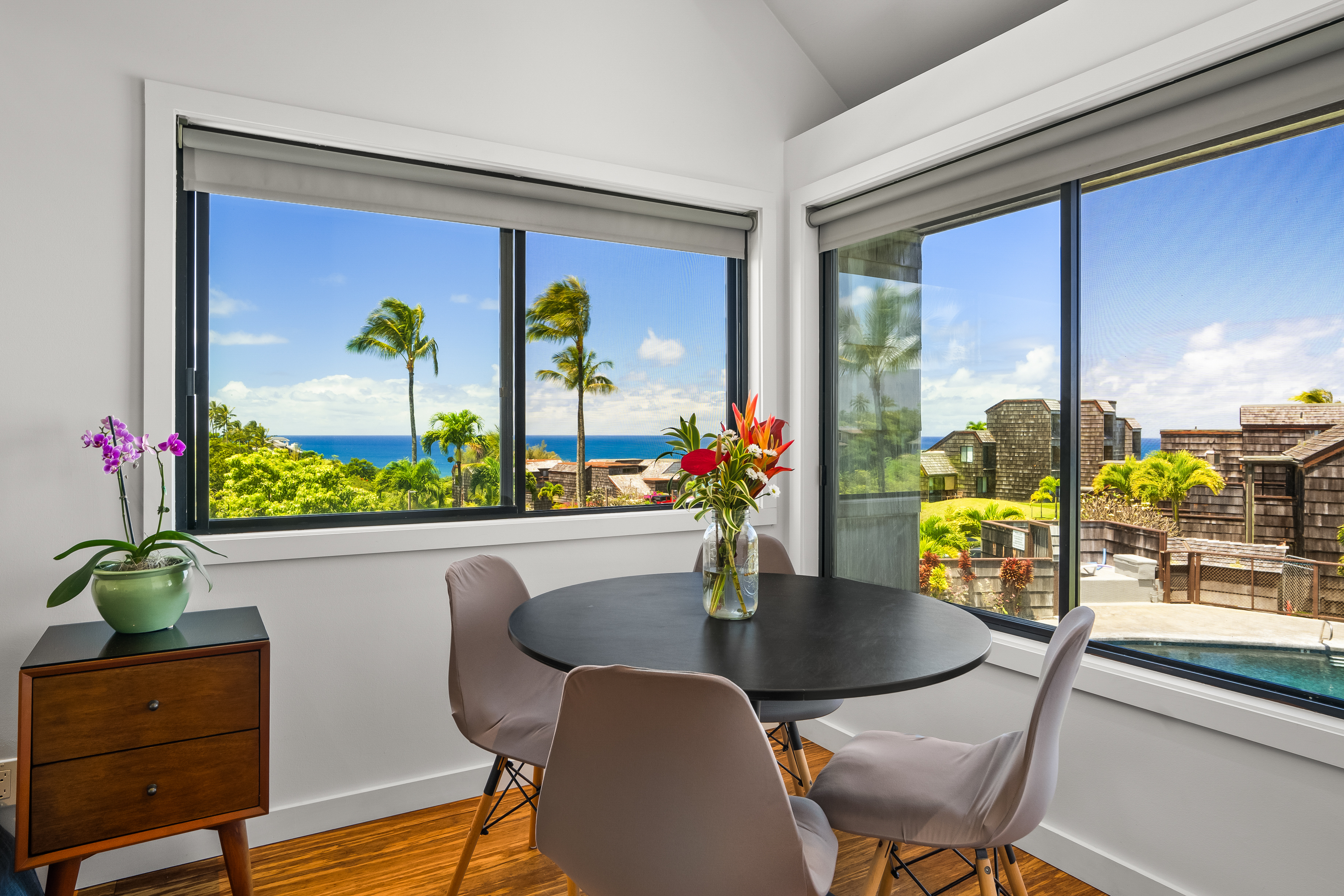 3700 Kamehameha Road, Unit F8 Princeville, HI 96722 - Photo 6 of 30 a dining room with furniture window and wooden floor