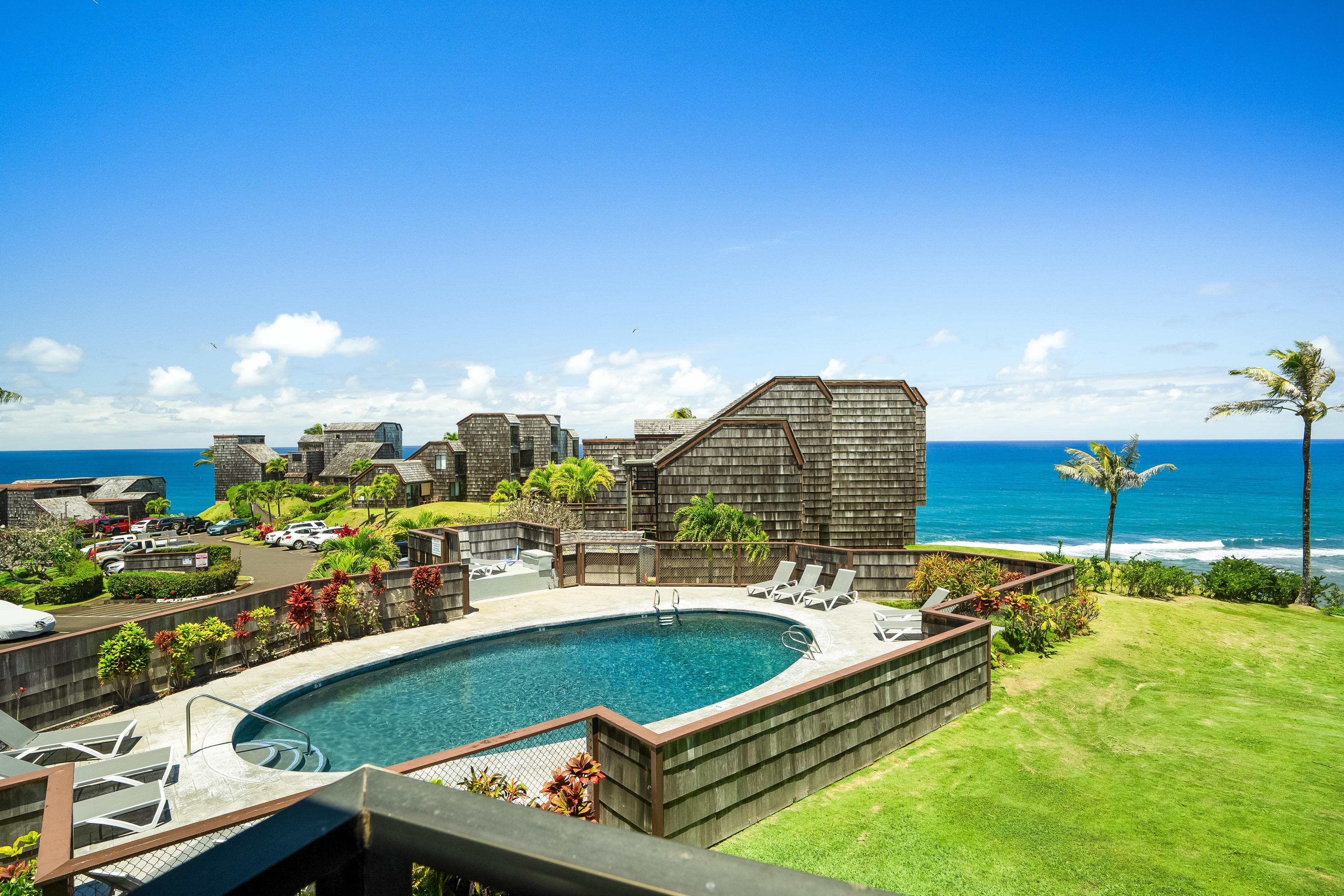 3700 Kamehameha Road, Unit F8 Princeville, HI 96722 - Photo 7 of 30 a view of a pool with chairs