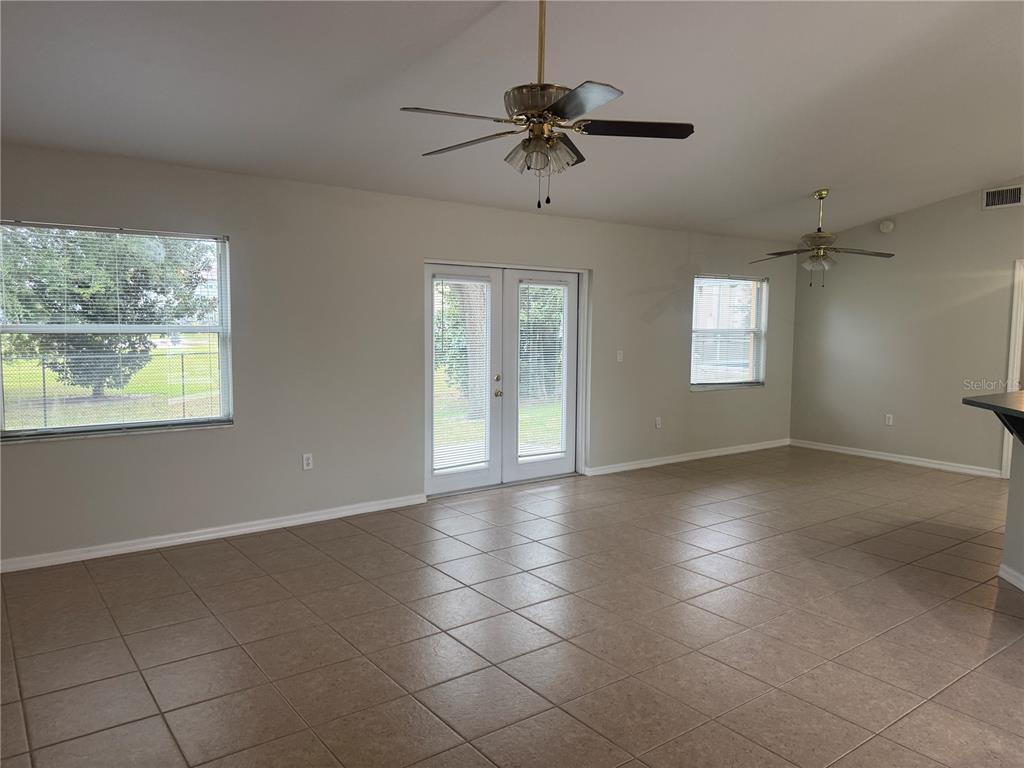 620 Reflections Loop West Winter Haven, FL 33884 - Photo 4 of 31 a view of an empty room with a window