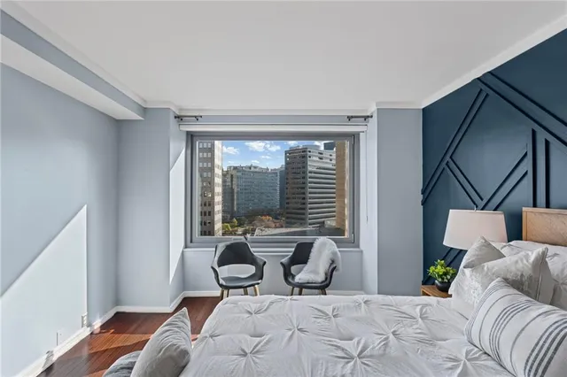 a workspace with furniture and window