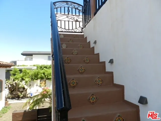 a view of staircase with window