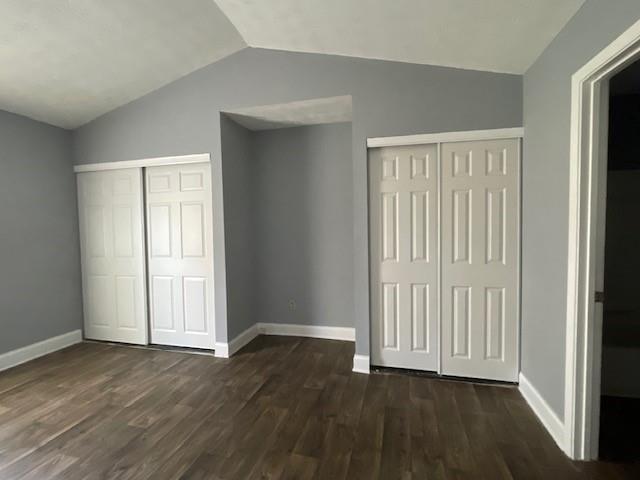 6721 Trafalger Square Norcross, GA 30093 - Photo 9 of 13 an empty room with wooden floor and windows