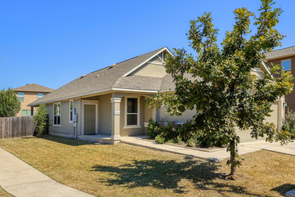 6300 Garden Rose Path Austin, TX 78754 - Photo 2 of 25 a view of a house with a backyard