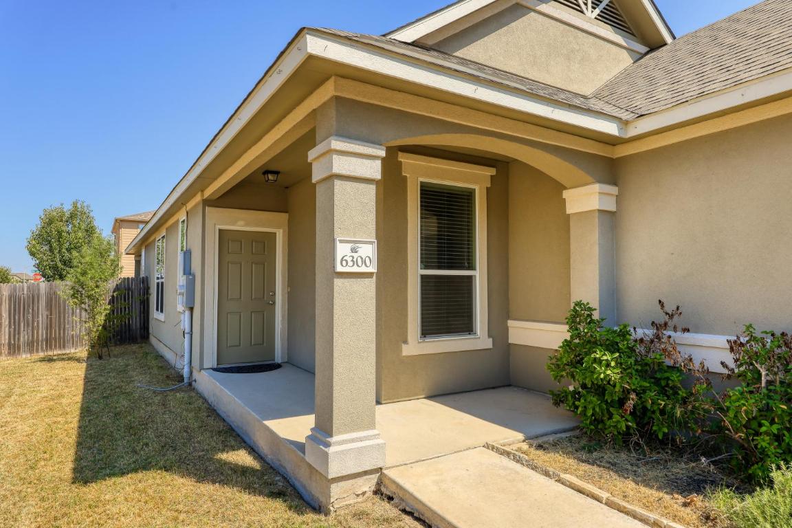 6300 Garden Rose Path Austin, TX 78754 - Photo 4 of 25 a view of house with door