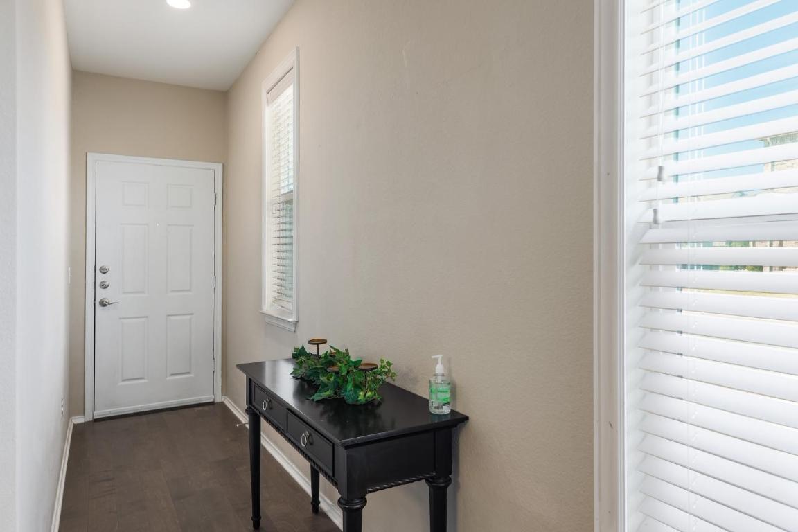 6300 Garden Rose Path Austin, TX 78754 - Photo 10 of 25 a room with a bench