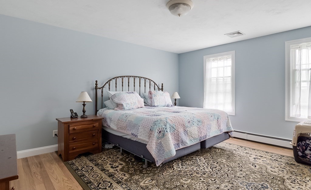 22 Vista Circle Rutland, MA 01543 - Photo 19 of 39 a bedroom with a bed and a window