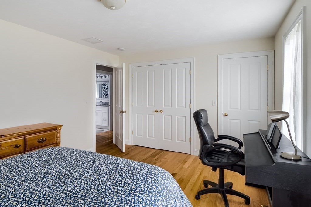 22 Vista Circle Rutland, MA 01543 - Photo 25 of 39 a bedroom with a bed and a desk