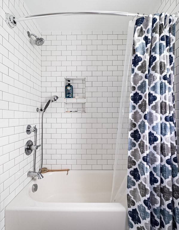 22 Vista Circle Rutland, MA 01543 - Photo 27 of 39 a bathroom with a bathtub and a shower