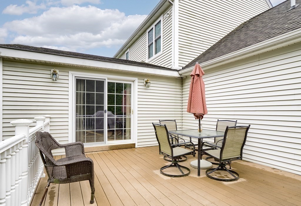 22 Vista Circle Rutland, MA 01543 - Photo 32 of 39 a view of a chair and table in deck