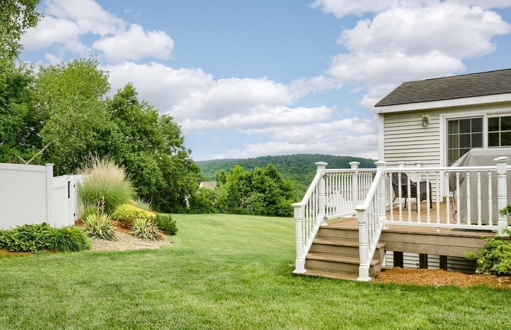 22 Vista Circle Rutland, MA 01543 - Photo 33 of 39 a view of a house with backyard sitting area and garden