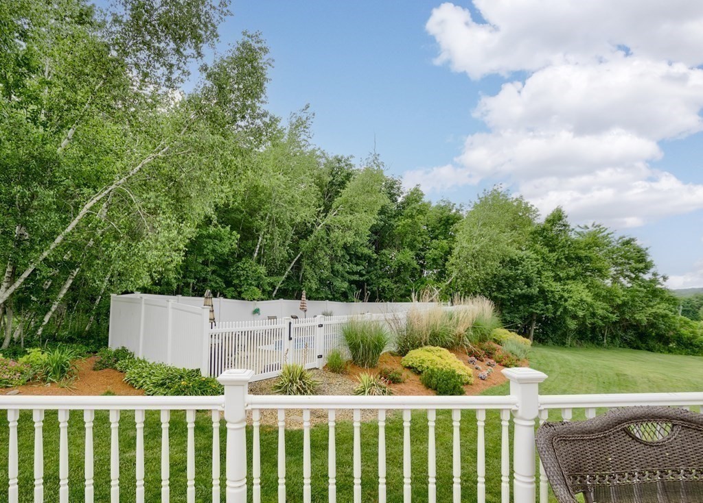 22 Vista Circle Rutland, MA 01543 - Photo 34 of 39 a wooden fence with trees in the background