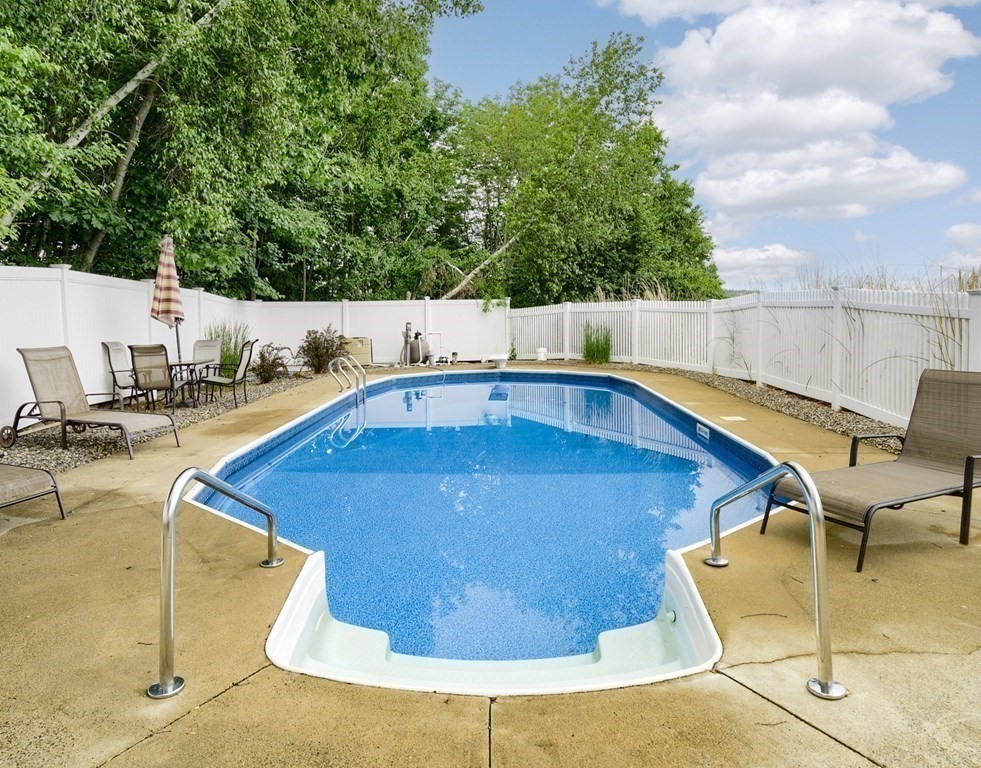 22 Vista Circle Rutland, MA 01543 - Photo 36 of 39 a view of a swimming pool with a patio