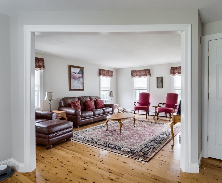 22 Vista Circle Rutland, MA 01543 - Photo 10 of 39 a living room with furniture and a window