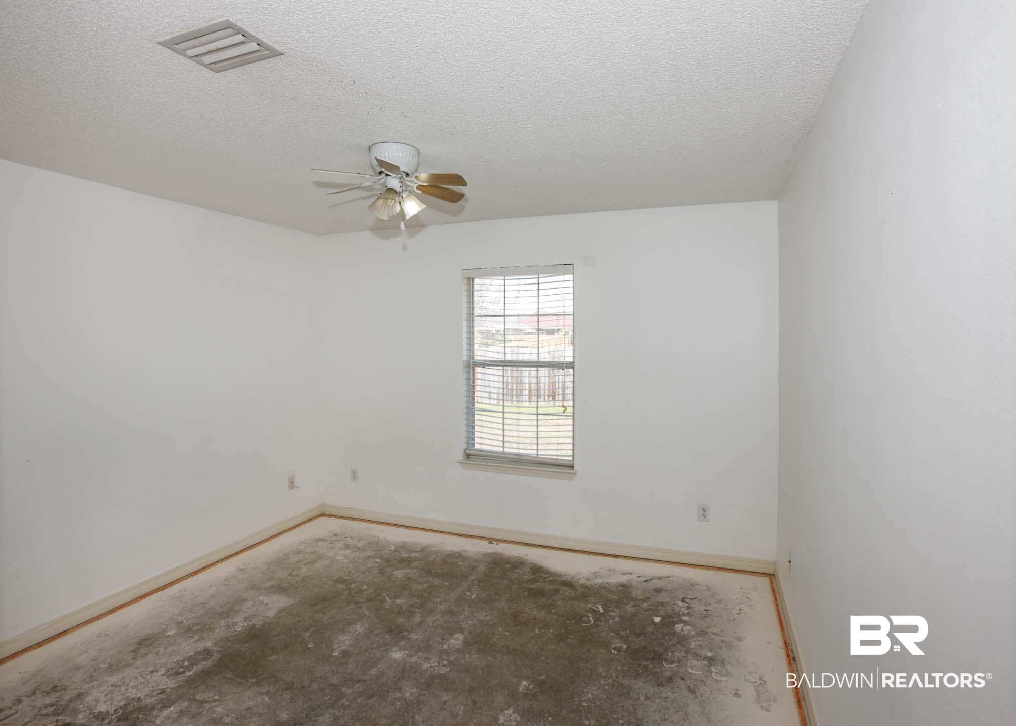 2530 Ashburn Lane Foley, AL 36535 - Photo 38 of 46 Unfurnished room with ceiling fan and a textured ceiling