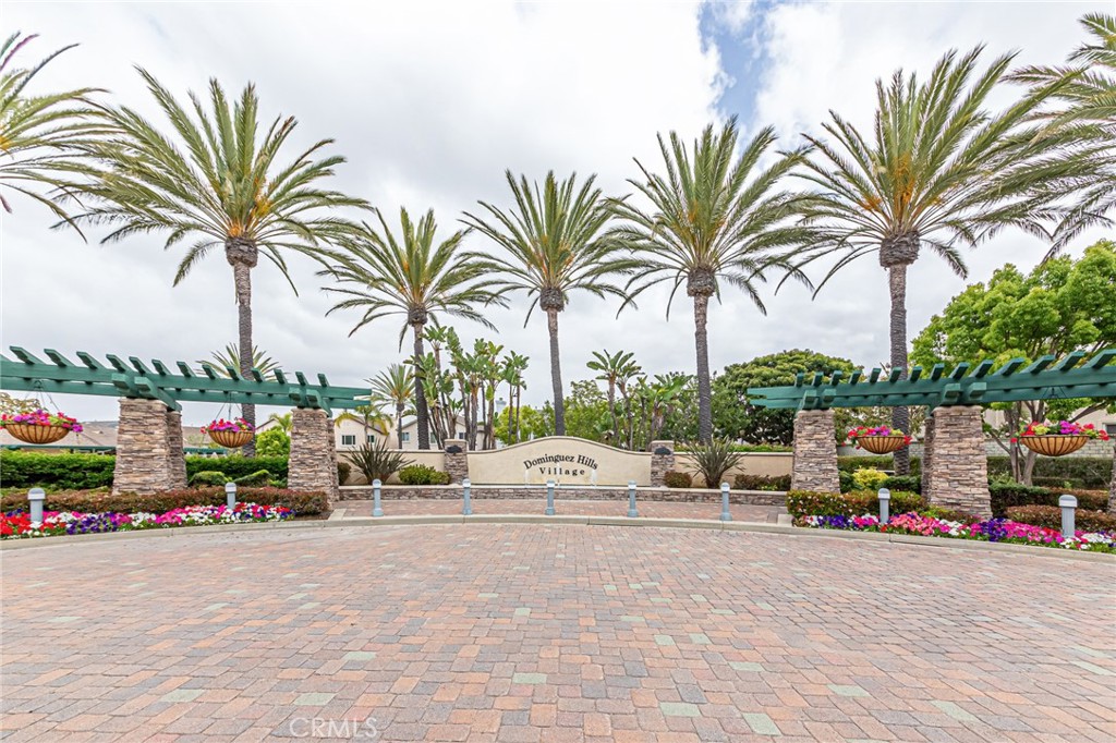 955 Blackberry Lane Carson, CA 90746 - Photo 48 of 53 a row of palm trees and a park