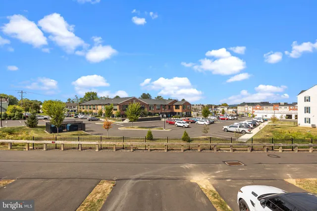 a view of a workspace with furniture