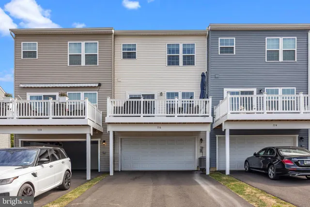 a view of a street with cars