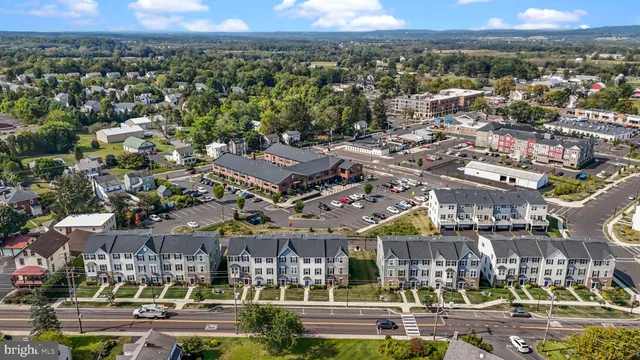 a picture of a bench in front of a wall