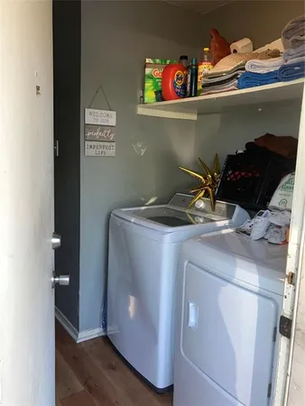 a kitchen with a stove and a refrigerator