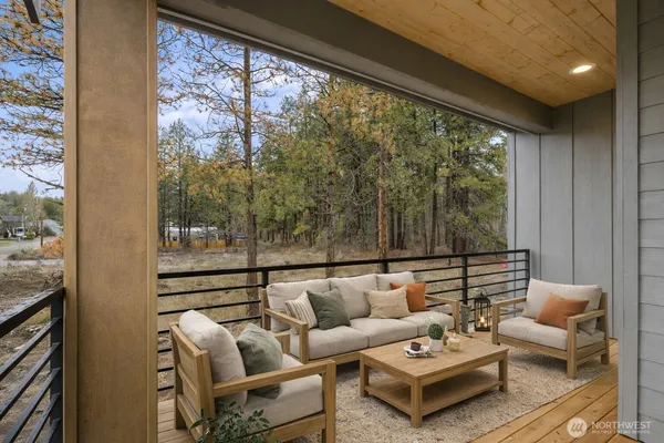 a outdoor living space with furniture and a potted plant