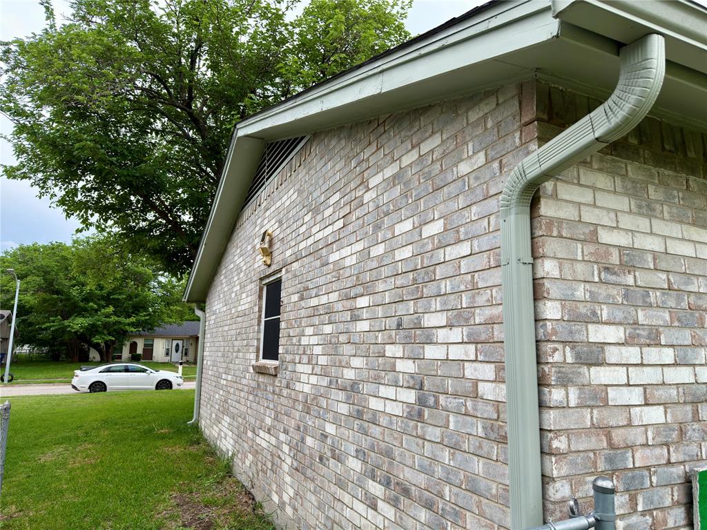 1519 Clearbrook Street Lancaster, TX 75134 - Photo 14 of 29 a backyard of a house with seating space