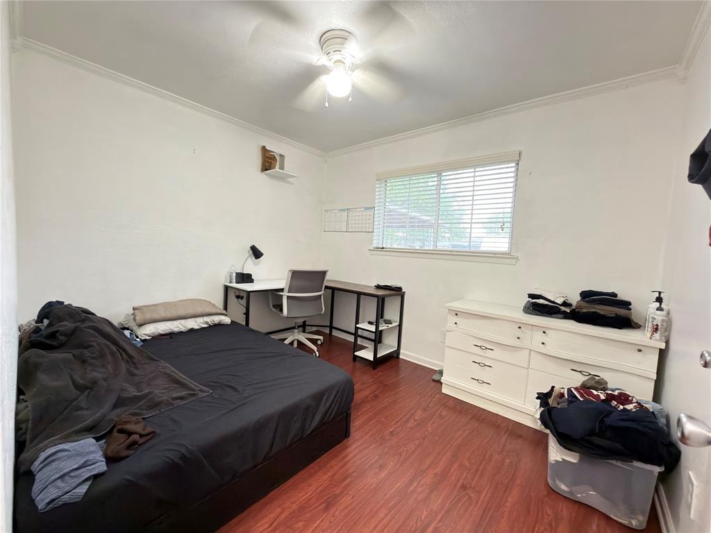 1519 Clearbrook Street Lancaster, TX 75134 - Photo 22 of 29 a living room with furniture and a wooden floor