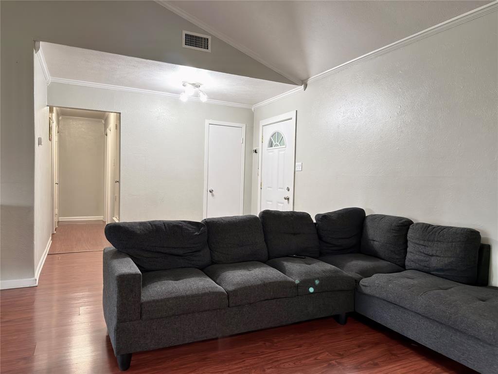 1519 Clearbrook Street Lancaster, TX 75134 - Photo 9 of 29 a living room with furniture and a couch