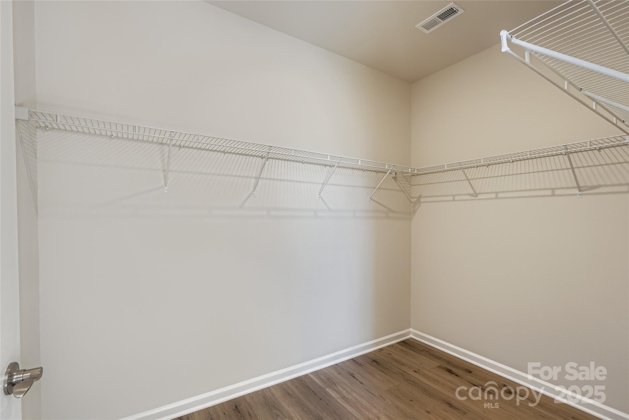 8487 Norman Frst Road Lancaster, SC 29720 - Photo 8 of 16 a view of a room with racks on the wall