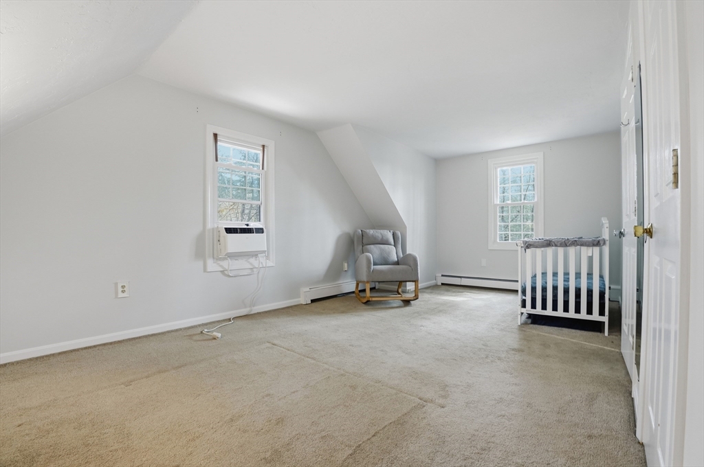 30 Packet Landing, Unit A Pembroke, MA 02359 - Photo 14 of 32 an empty room with windows