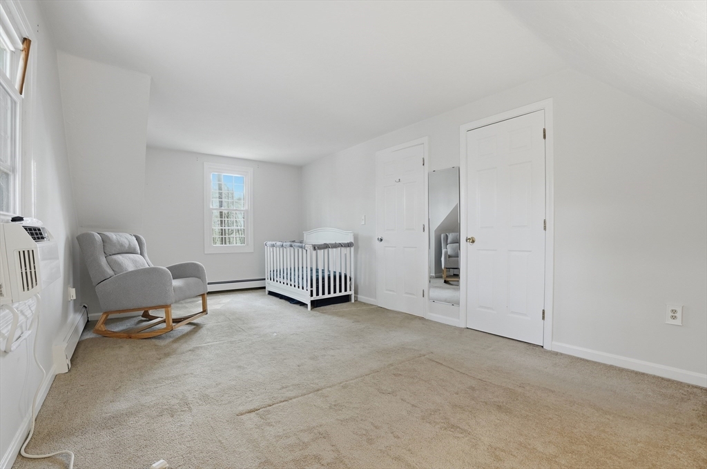 30 Packet Landing, Unit A Pembroke, MA 02359 - Photo 15 of 32 a view of a livingroom with furniture and a window