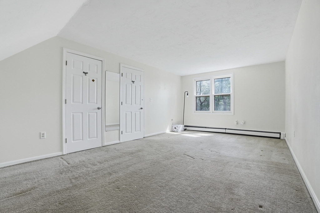 30 Packet Landing, Unit A Pembroke, MA 02359 - Photo 19 of 32 an empty room with windows